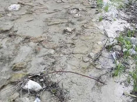 Infiltrazione e trasporto di marmettola nelle falde acquifere carsiche apuane